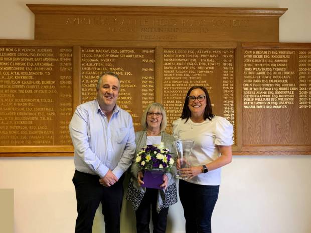 Gilmour Lawrie, Business Coordinator and Claire Kimm, General Manager present Lesley with her retirement gifts.