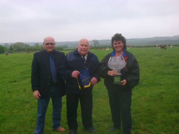 Right to left - Lisa Window-Walker and her late father Chris Window being presented with the Haresfoot Vase by Alan Timbrell