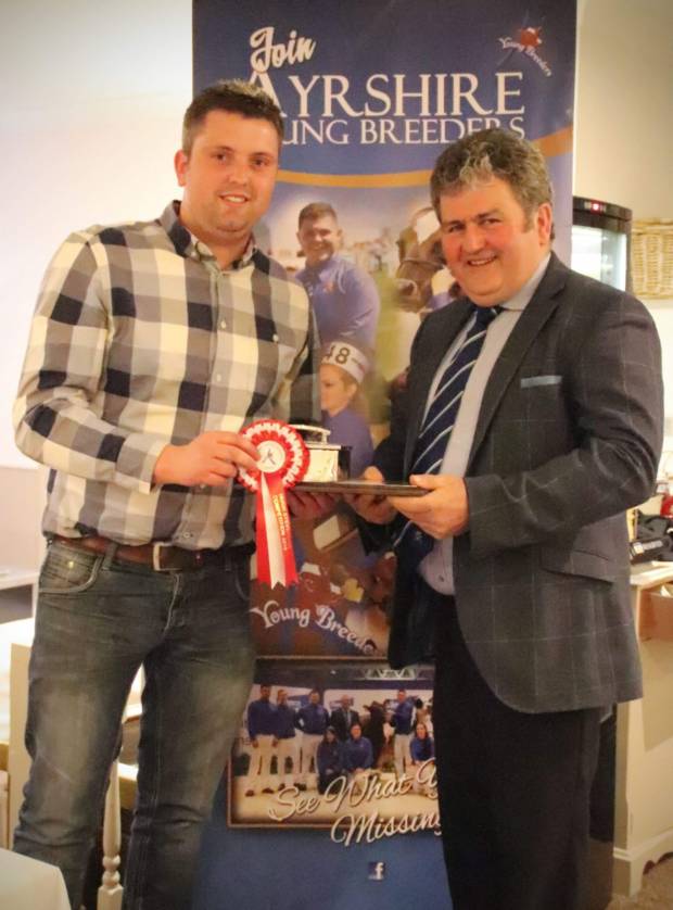 Stockjudging and Sire Selection senior winner Asher Bradley Seddon with Society President Keith Davidson