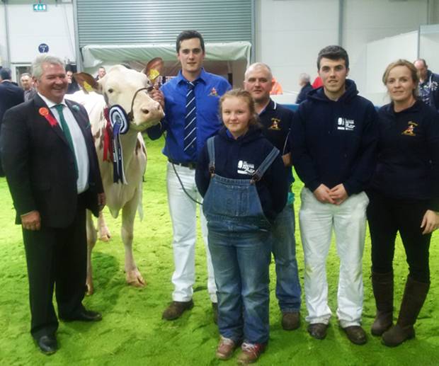 Judge - Selwyn Donald (left) with the Keenan family and their champion Ayrshire